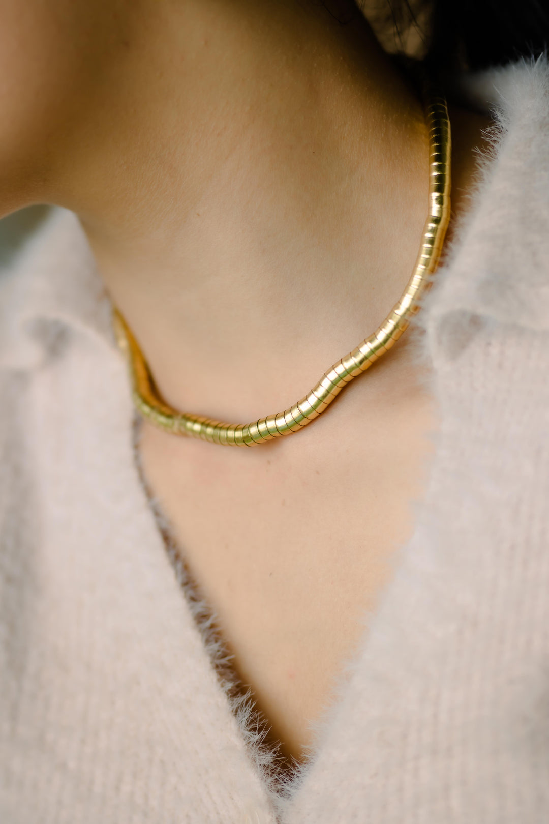 Colliers de pierres précieuses superposées