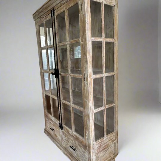 Large wooden cabinet with glass doors