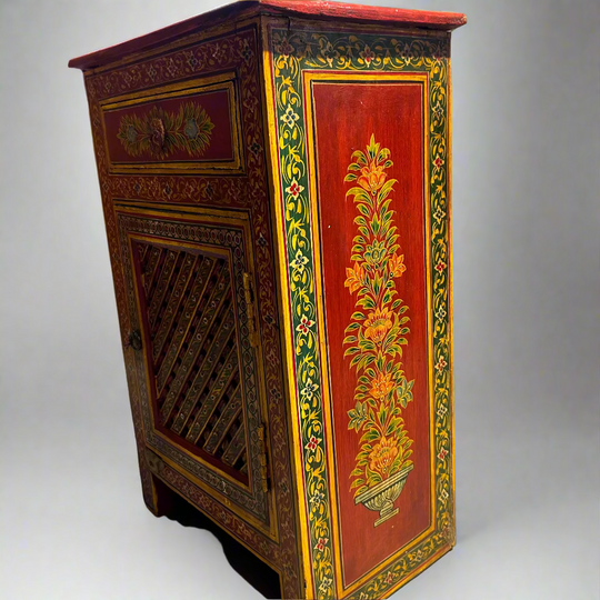 Decorative wooden cabinet with floral patterns