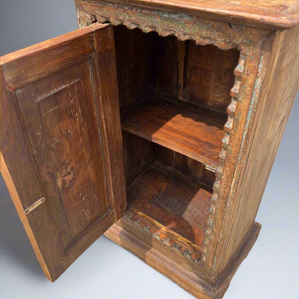 Wooden cabinet with open door