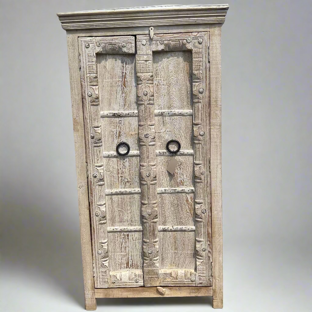 Wooden cabinet with decorative carvings