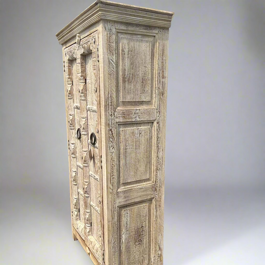 Wooden cabinet with intricate carvings
