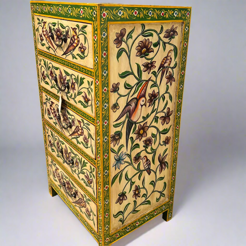 Decorative chest of drawers with floral and bird patterns.