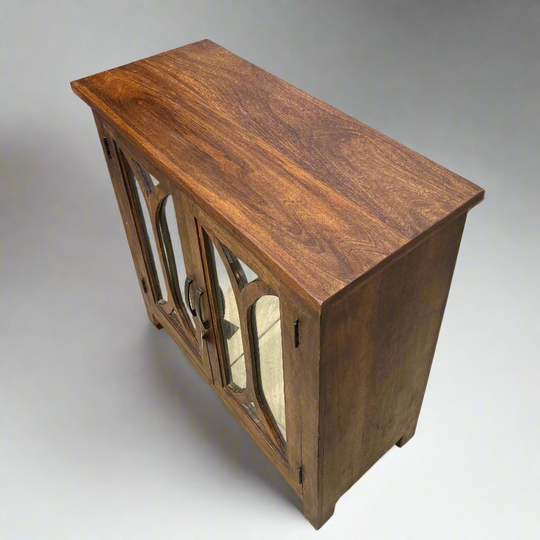 Wooden cabinet with a mirror