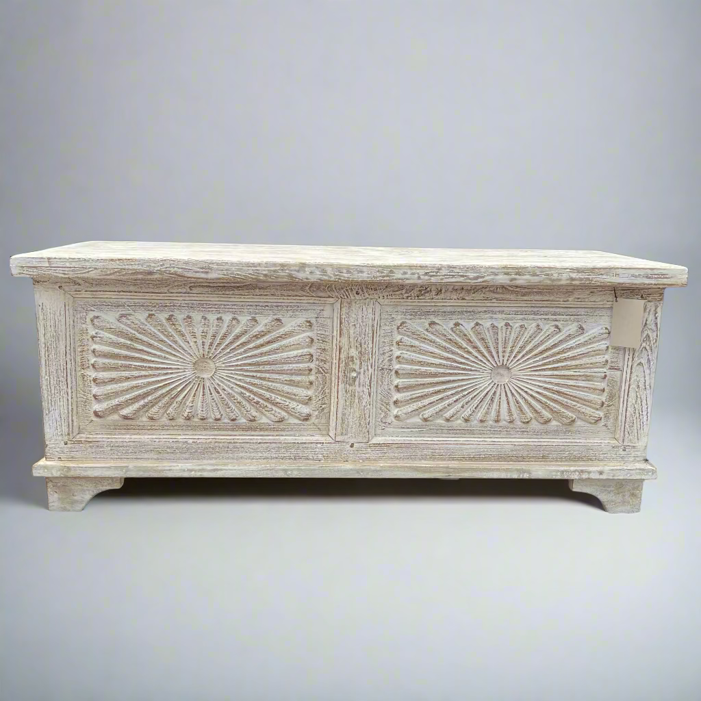 Decorative wooden bench with a sunburst pattern