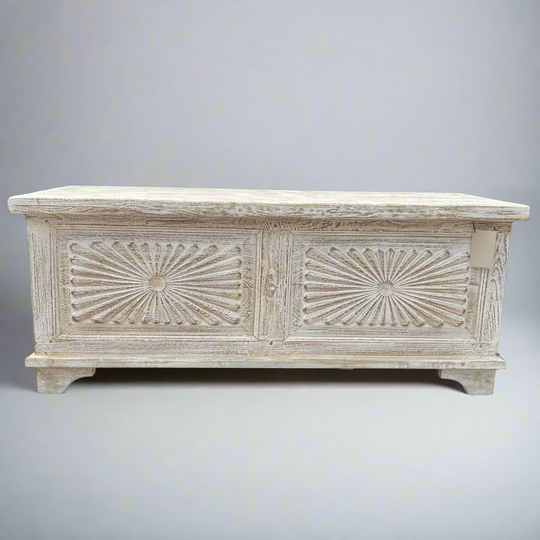 Decorative wooden bench with a sunburst pattern