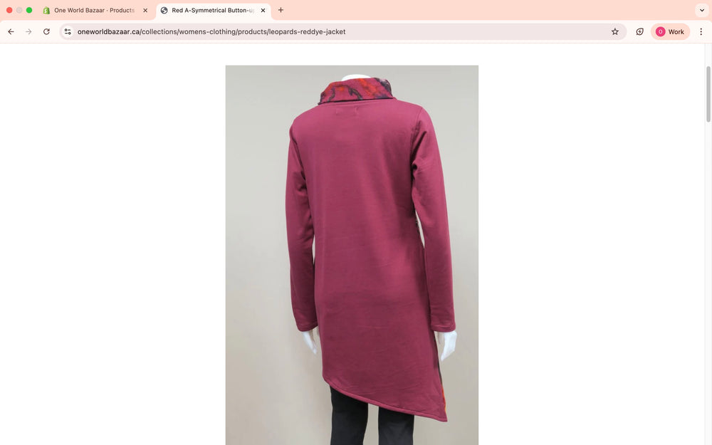 Maroon dress on a mannequin against a plain background