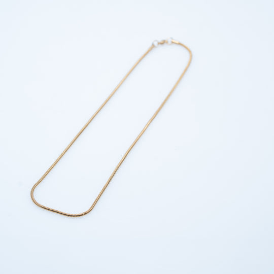 Colliers de pierres précieuses superposées