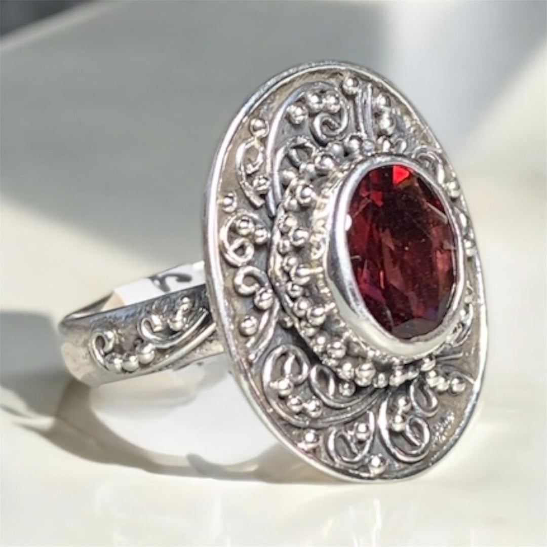 Ornate Oval Garnet Carved Ring