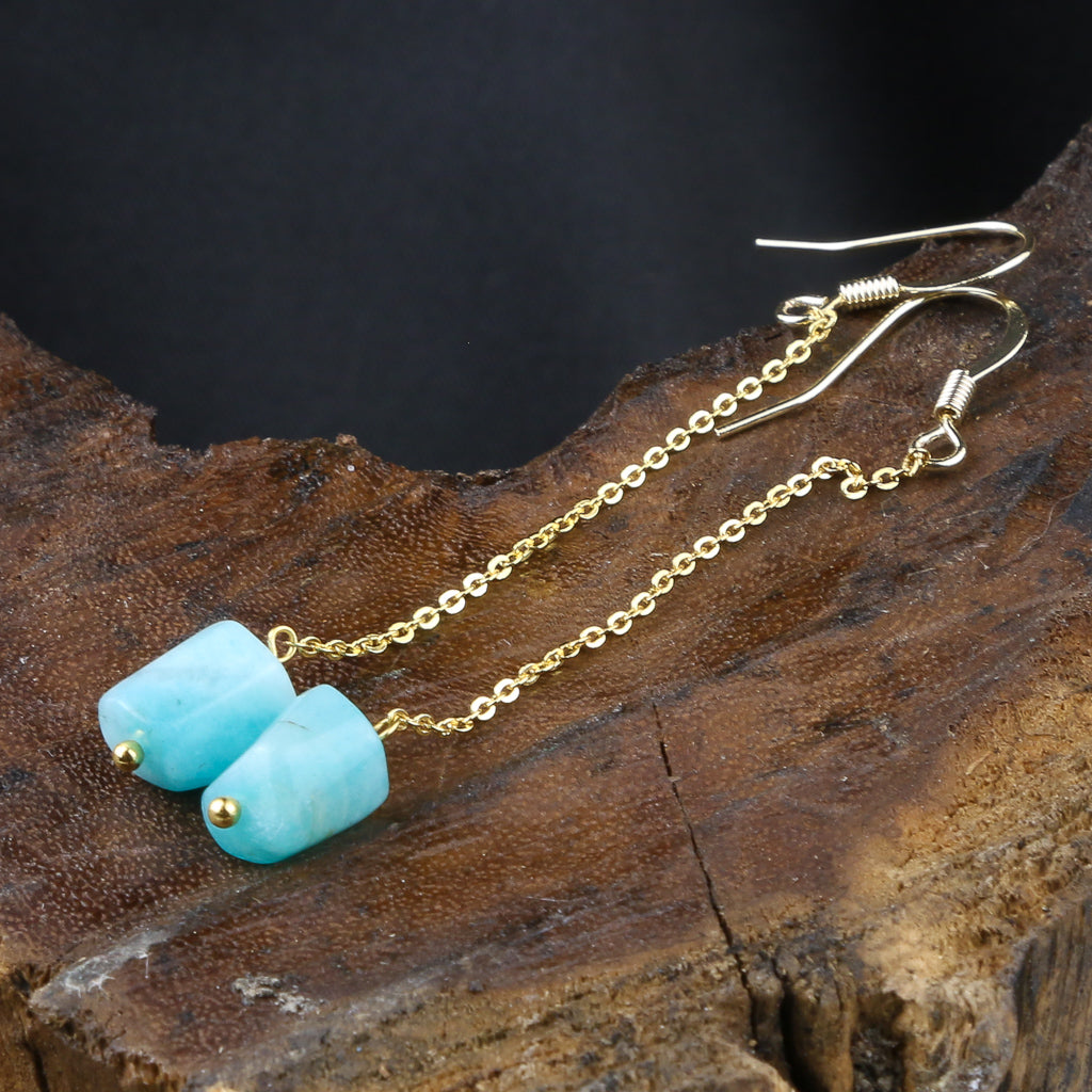 Boucles d'oreilles pendantes en or avec pierre aqua