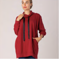 Red hoodie with a black tie worn by a model on a light gray background