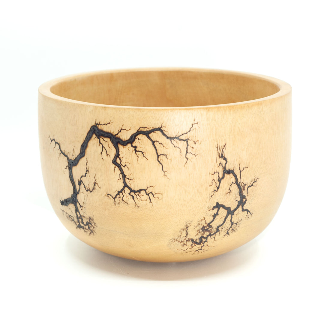 Photo of mango wood product with tree root pattern on it