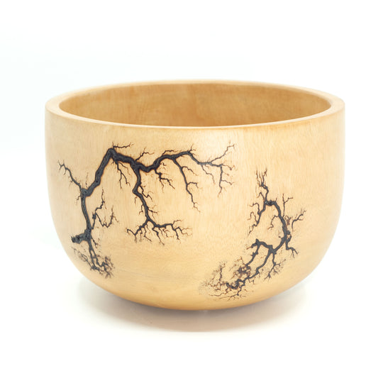 Photo of mango wood product with tree root pattern on it