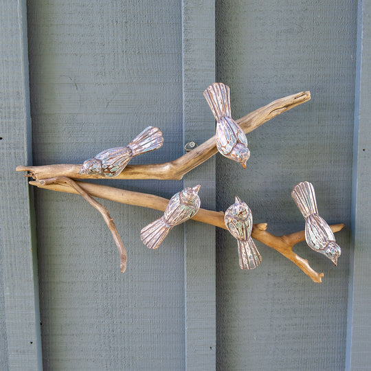 Five Light Purple Birds on Driftwood