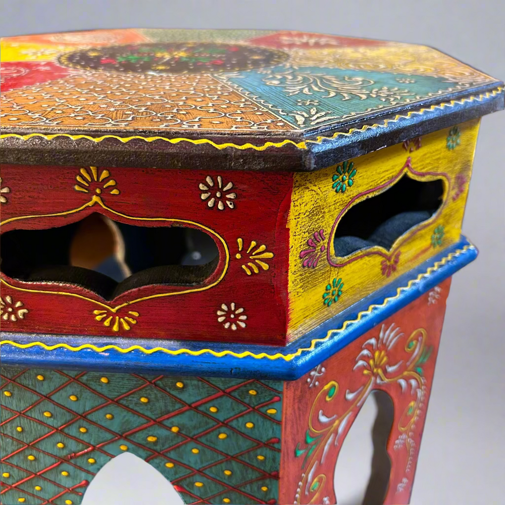Colorful hexagonal wooden stool with intricate designs