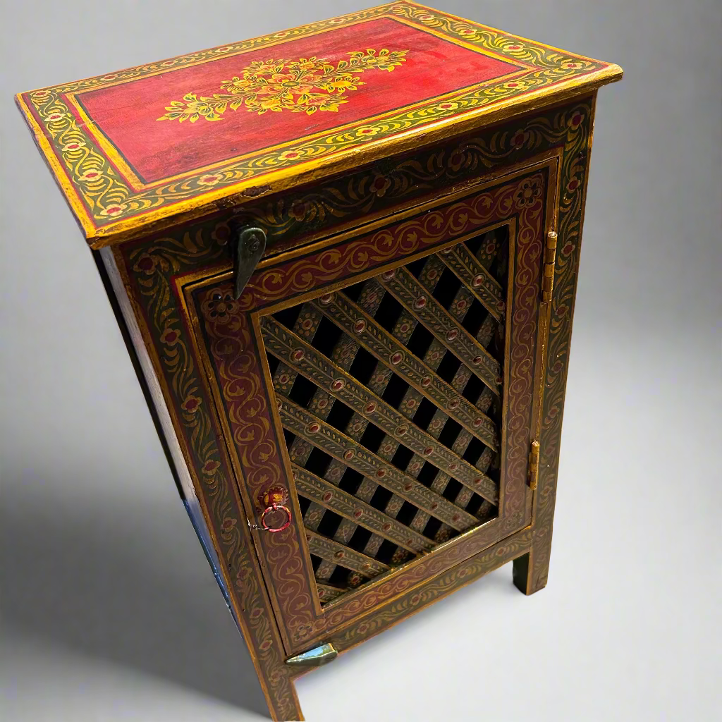 Decorative wooden cabinet with red top and lattice door 