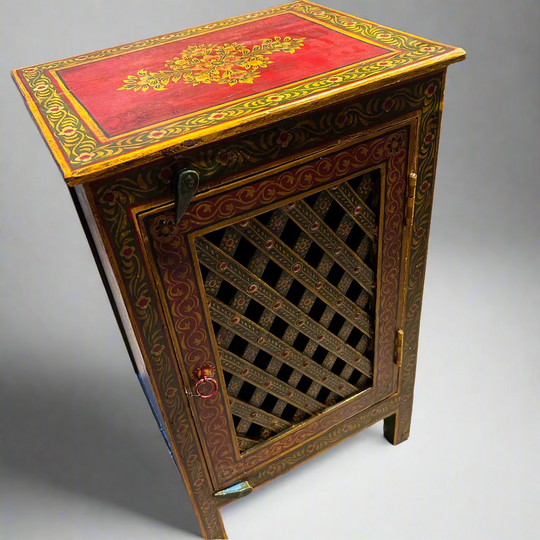 Decorative wooden cabinet with red top and lattice door 