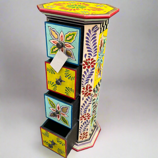 Colorful hexagonal cabinet with floral designs 