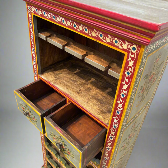 Wooden cabinet with colorful painted design 
