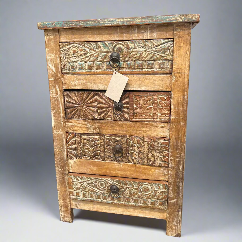 Wooden dresser with intricate carvings 