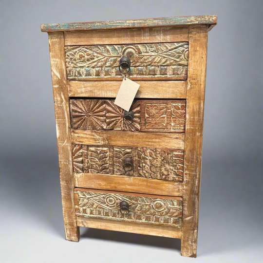 Wooden dresser with intricate carvings 