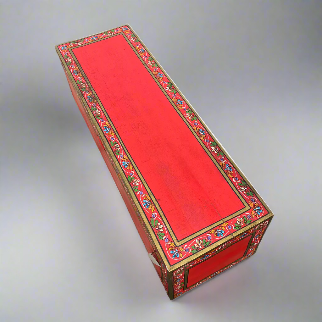 Red decorative box with intricate patterns