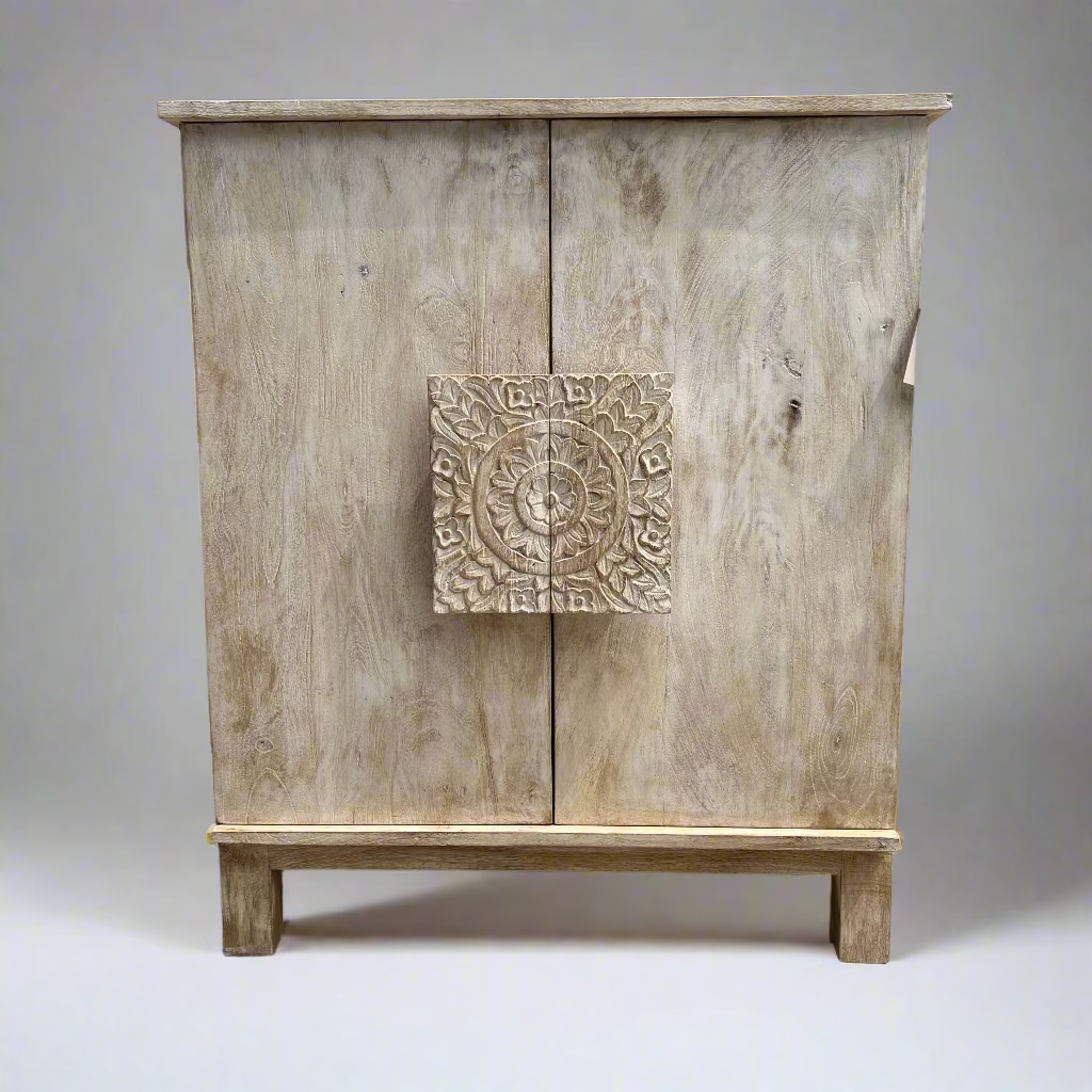 Wooden cabinet with decorative panel on a patio