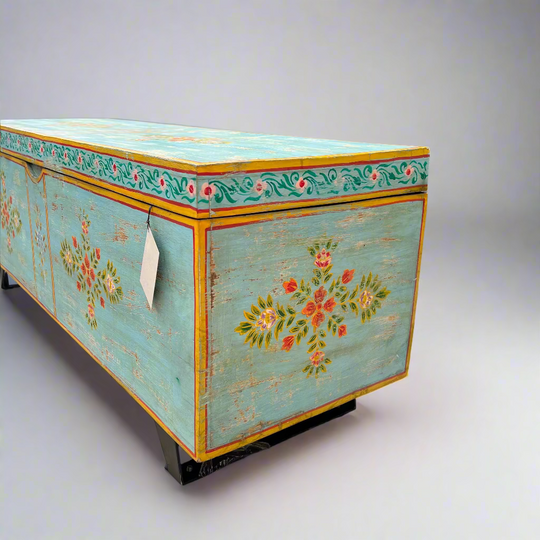 Blue wooden chest with floral designs