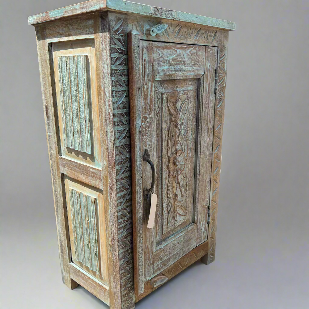 Wooden cabinet with intricate carvings 