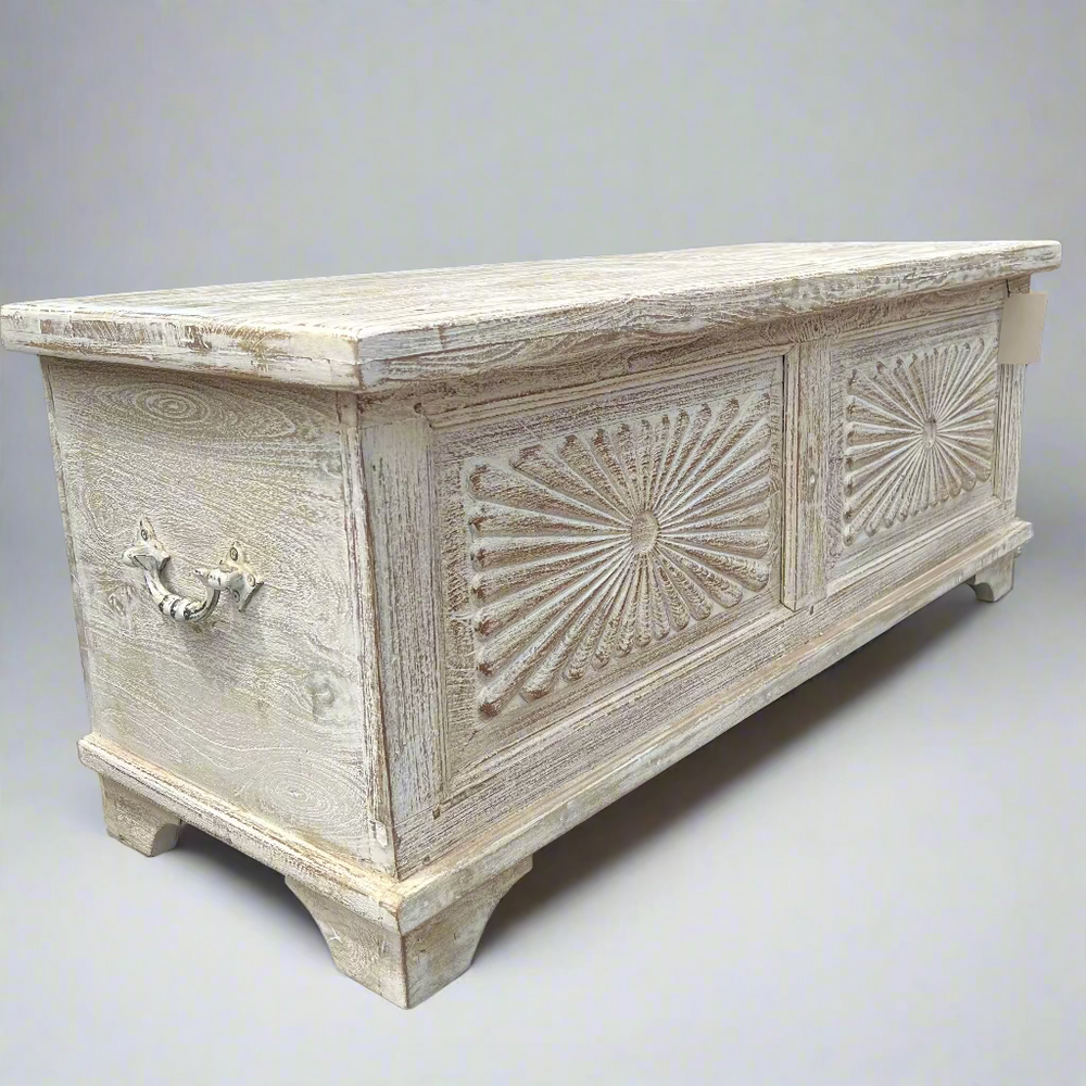 Decorative wooden chest with intricate carvings 