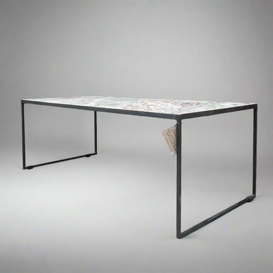 Modern outdoor table with a textured surface 