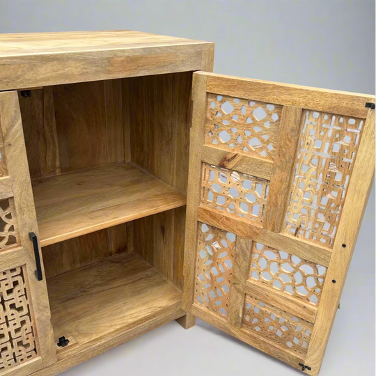 Wooden cabinet with intricate carvings 