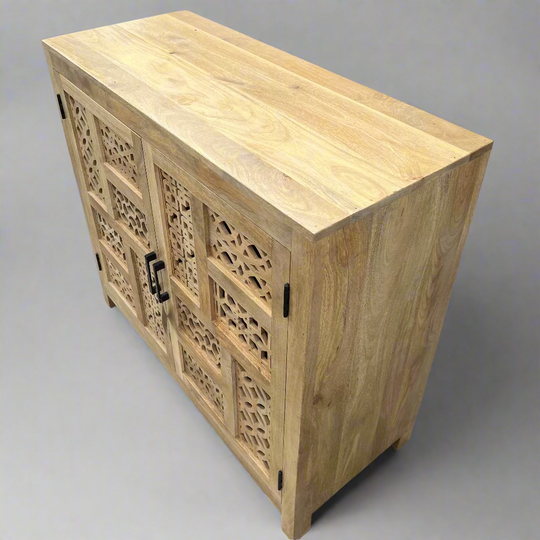Wooden cabinet with intricate carvings 