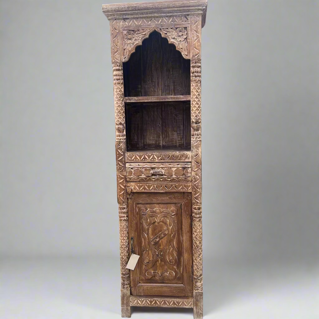 Wooden cabinet with intricate carvings 