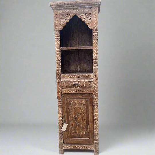 Wooden cabinet with intricate carvings 