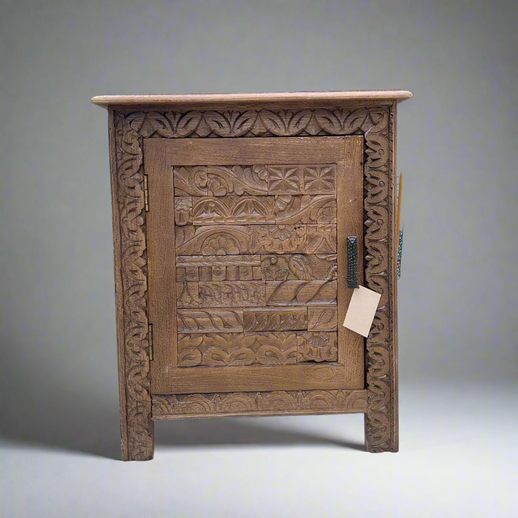 Wooden cabinet with intricate carvings 