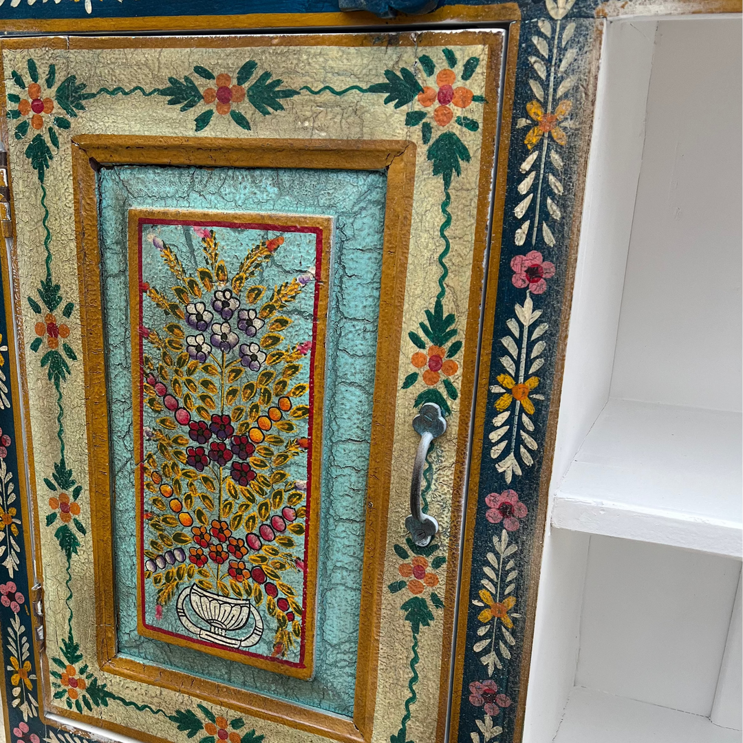 Decorative cabinet with floral mosaic design 