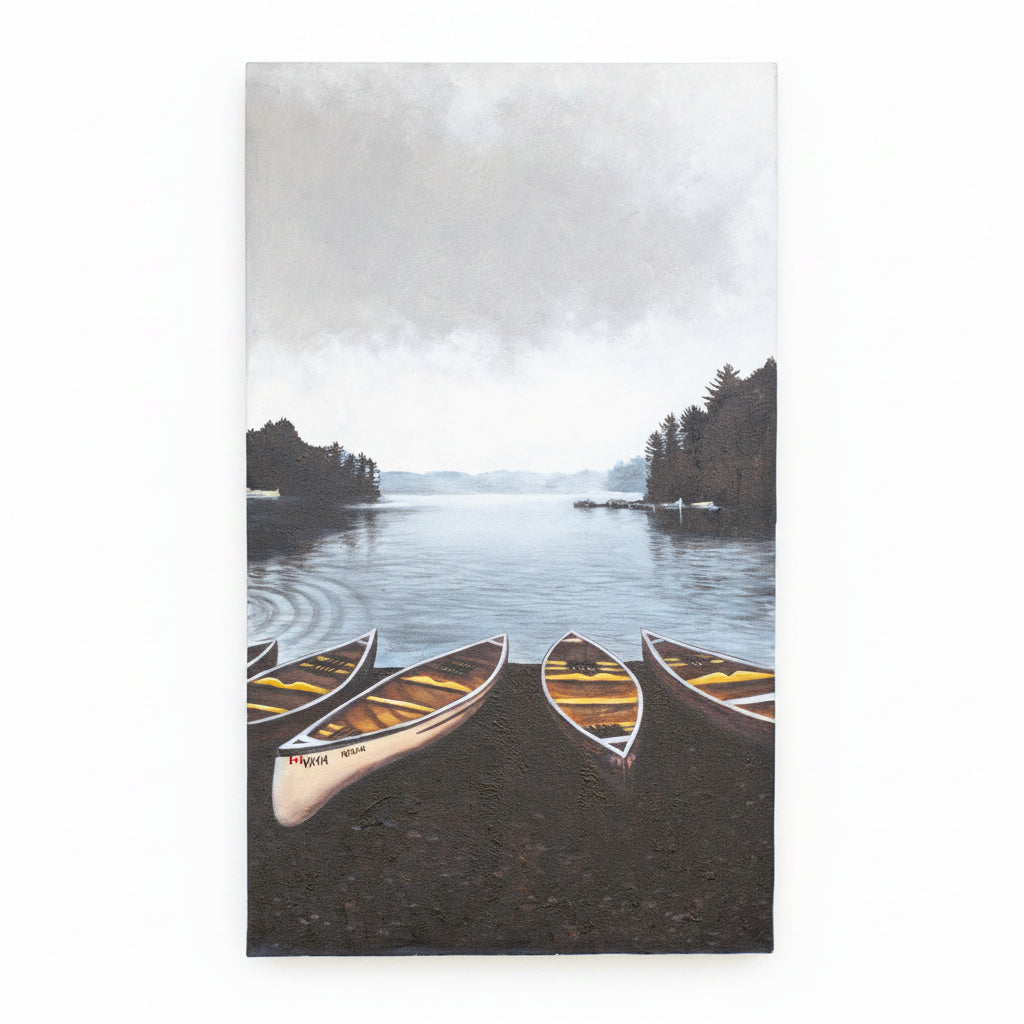 Canoes by the lakeside ready to launch