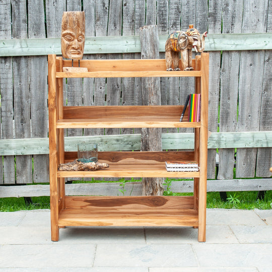 An image of an Indonesian Teak Classic Bookcase. This bookcase embodies timeless elegance and craftsmanship. Made from Indonesian teak wood, the bookcase features a sturdy construction and a rich, lustrous finish.
