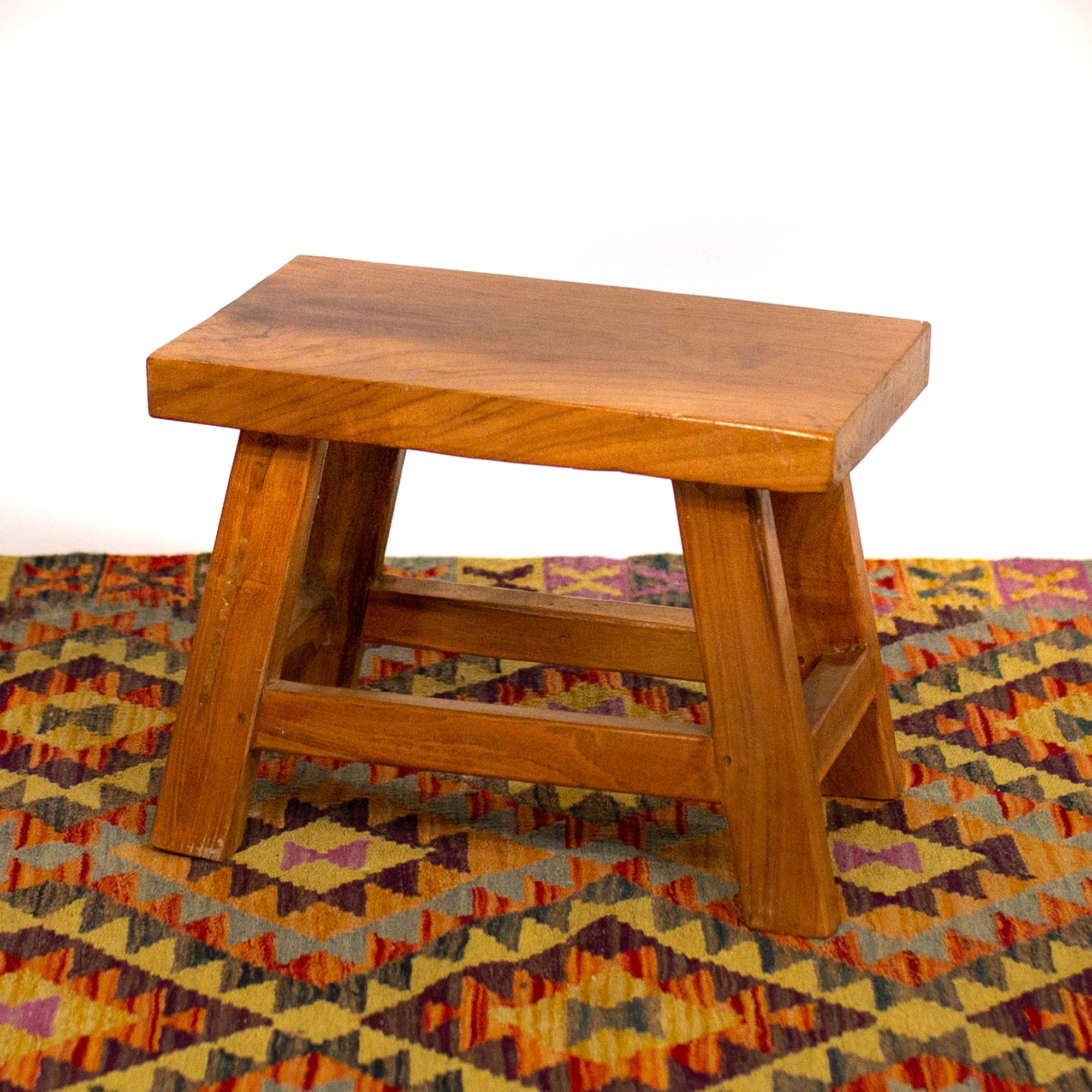 Photo of small wooden javanese stool