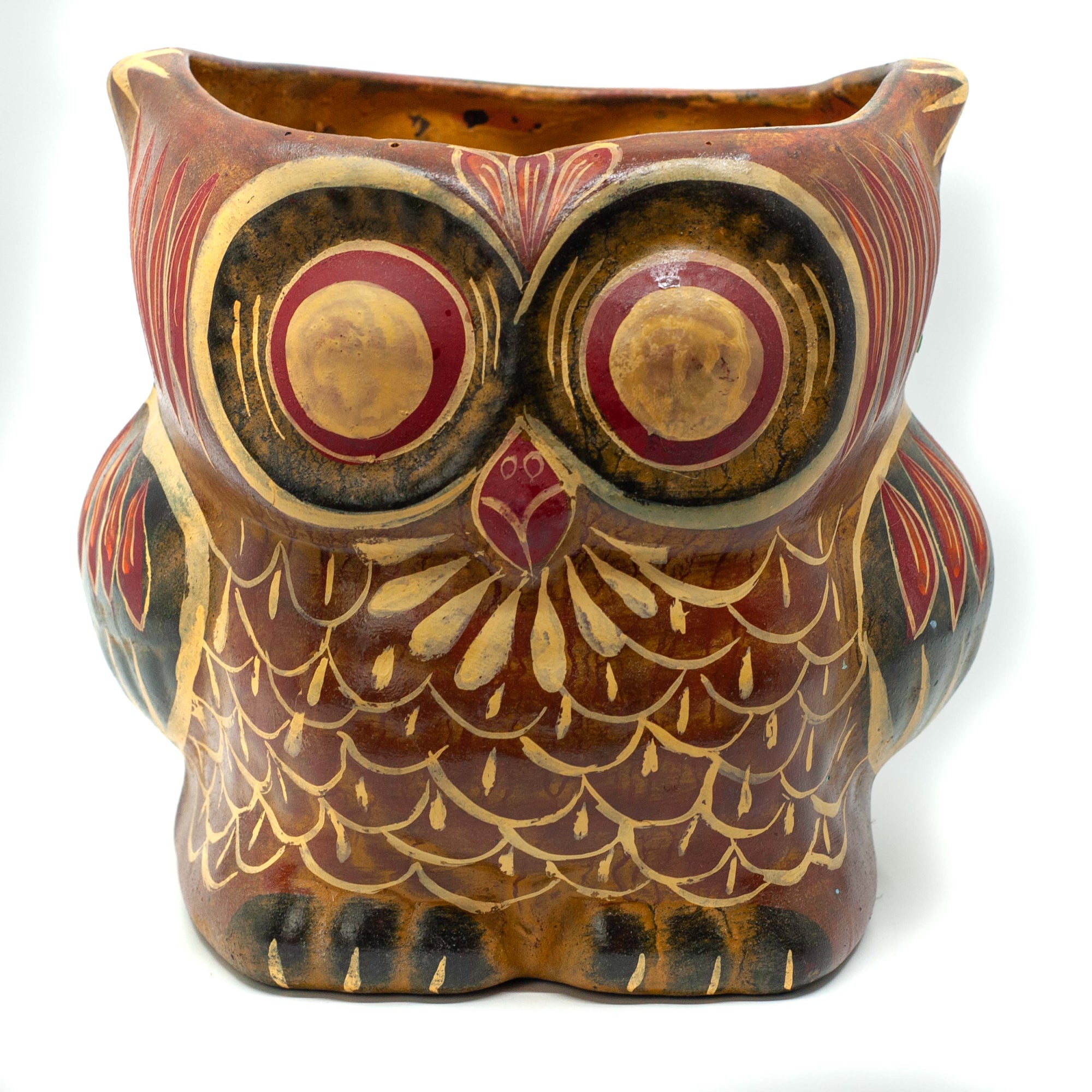 Photo of terracotta hand-painted planter in the shape of an owl 