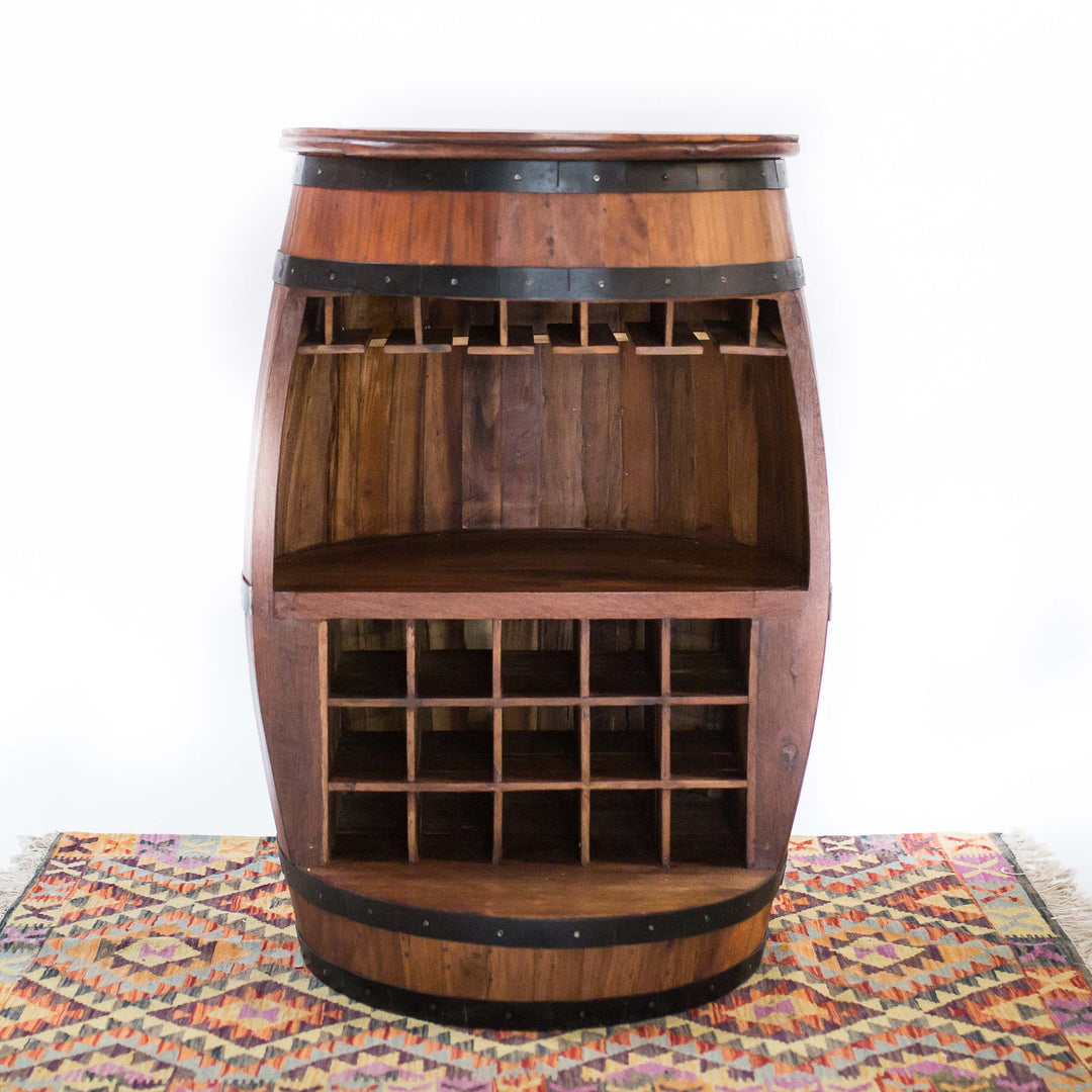 Photo of a teak wood barrel table with room for wine bottles and glasses.
