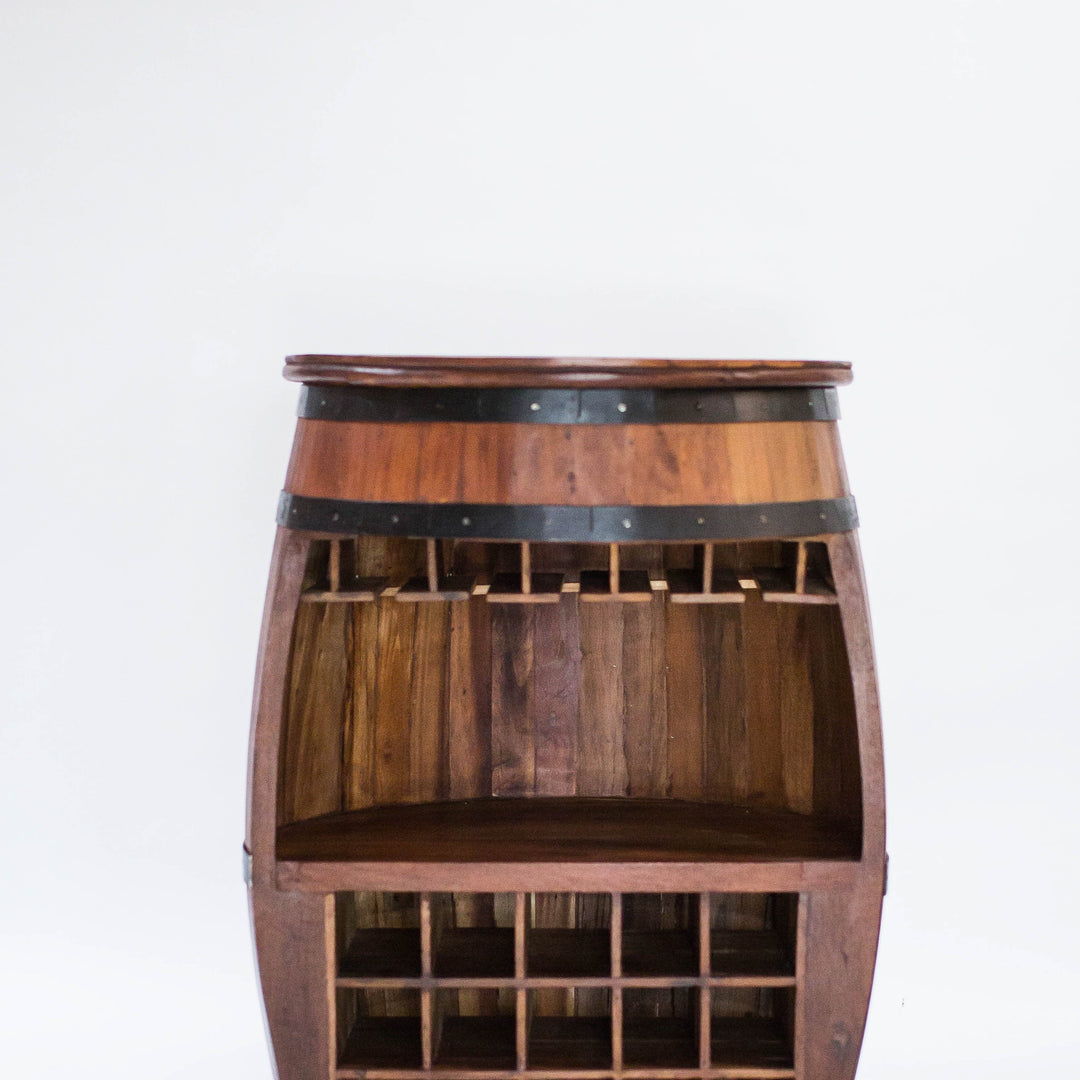 Photo of a teak wood barrel table with room for wine bottles and glasses.