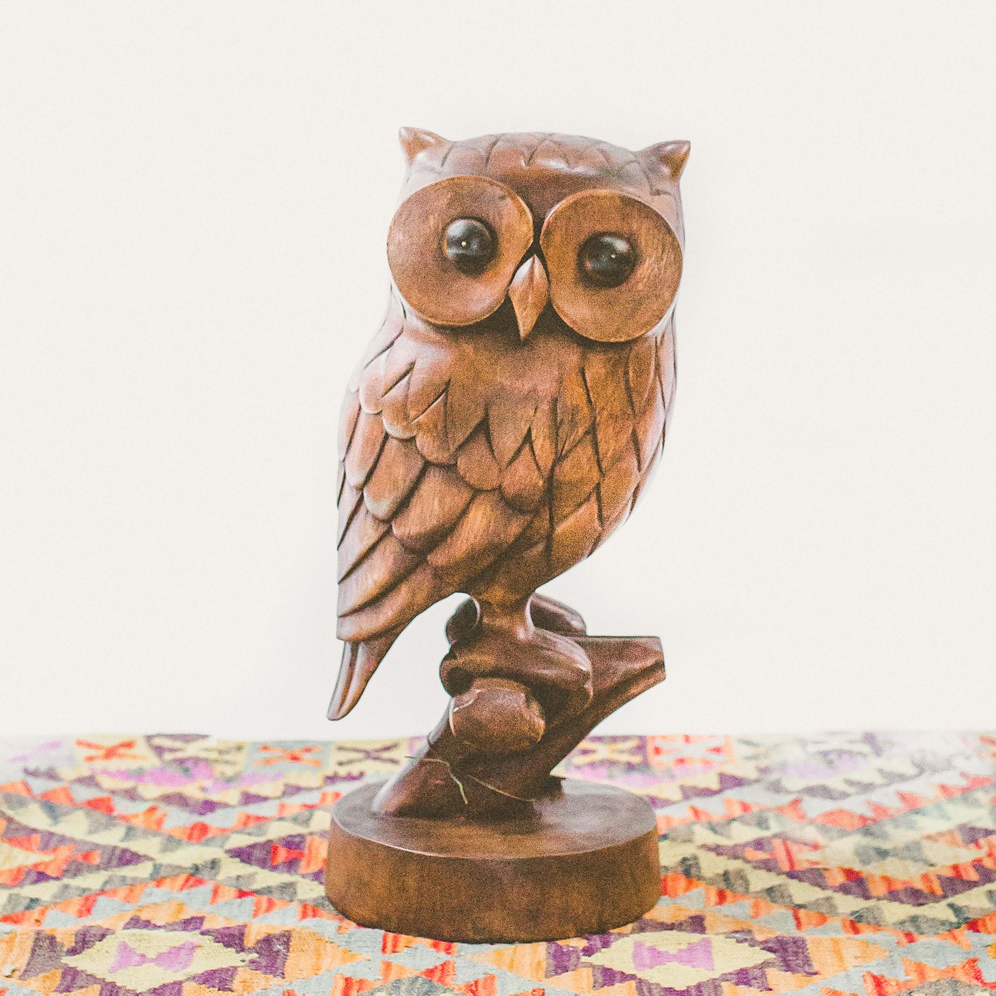 Photo of wood carved owl statue