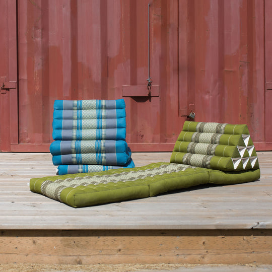 Photo of a folding yoga cushion in various positions, a blue colour and a green colour